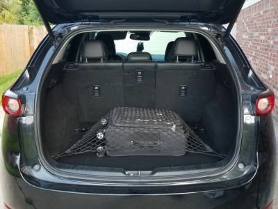 Comment préparer votre départ en Mazda avec des rangements pour votre coffre